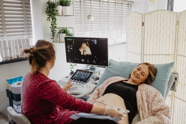 Maria Birch, The Scan Lady, performing a private pregnancy ultrasound scan at Sneak-A-Peek Ultrasound.